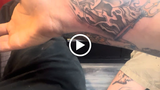 Explore globe tattoo ideas, creative tattoo ideas in Rockford, available at Tattoo Bobs