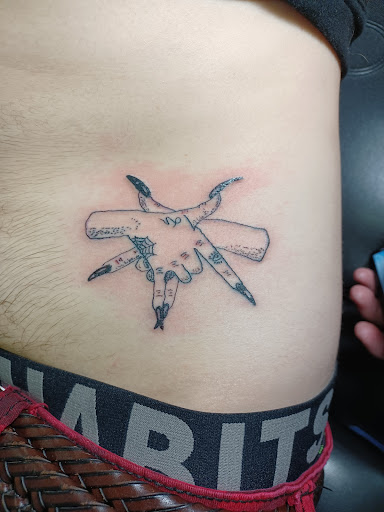 Explore tulip tattoo ideas, creative tattoo ideas in Owosso, available at Twisted ink tattoo