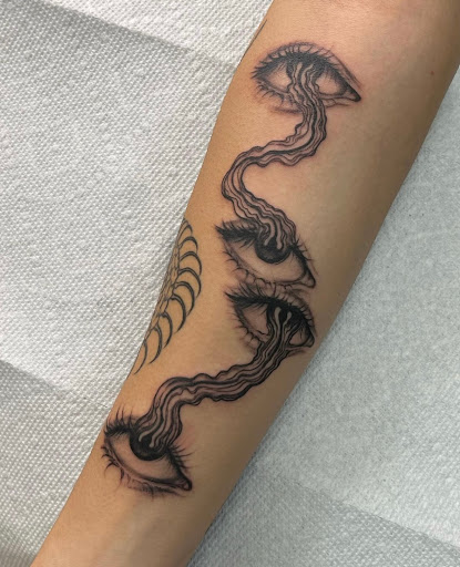 Explore mic tattoo ideas, creative tattoo ideas in Edison, available at Tattoo Asylum