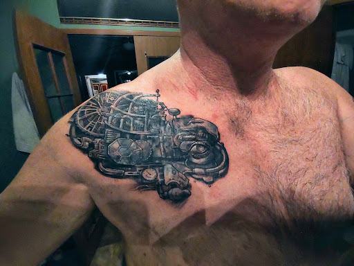 Explore 2001 tattoo ideas, creative tattoo ideas in Sioux City, available at Addictive Tattoo-Piercing