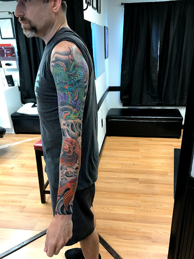 Explore chest and arm tattoo ideas, creative tattoo ideas in Tarpon Springs, available at Legendary Custom Tattoos and Piercings