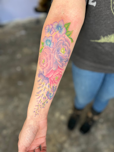 Explore overcoming trauma tattoo ideas, creative tattoo ideas in Toledo, available at Art Bound Studio