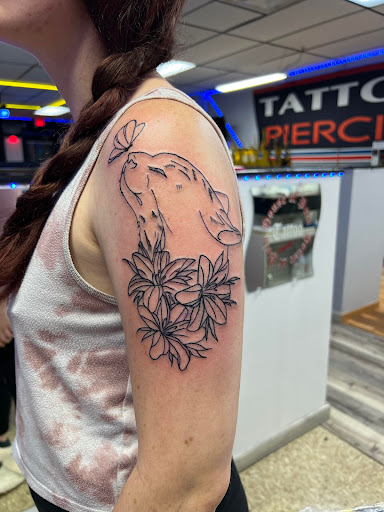 Find angel hand tattoo ideas for your next unique tattoo in Rockford at House Of Pain Tattoo co.