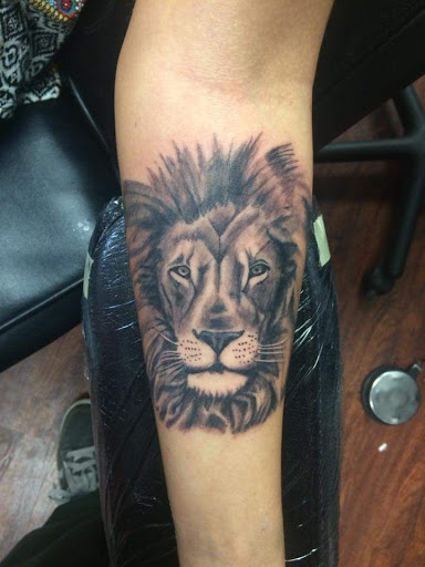 Explore broken heart tattoo ideas for guys, creative tattoo ideas in Powell, available at Against All Odds Tattoos and Piercings