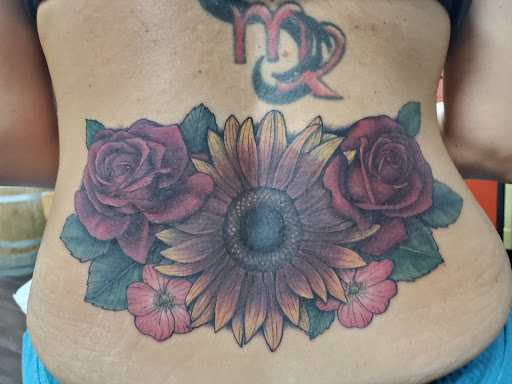 Explore fine line spine tattoo ideas, creative tattoo ideas in Las Vegas, available at Black Sacrament Tattoo