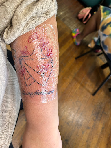 Explore lower back tattoo ideas for men, creative tattoo ideas in Houston, available at 713 Tattoo Parlour