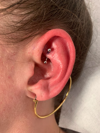 Explore skull neck tattoo ideas, creative tattoo ideas in Round Rock, available at Piercings by Toni