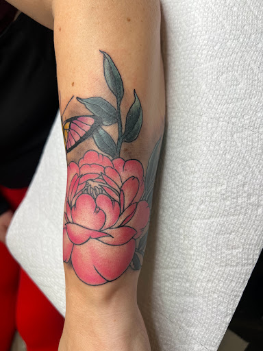 Explore sunflower arm tattoo ideas, creative tattoo ideas in Russellville, available at AR Ink