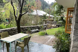 Trimurti garden Cafe and Homestay Dharamkot image