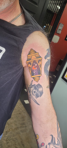 Explore globe tattoo ideas, creative tattoo ideas in Paducah, available at Knuckle Up Tattoo Co.
