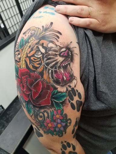 Explore therapist tattoo ideas, creative tattoo ideas in Rogers, available at Jimmy Romance Tattoo & Body Piercing