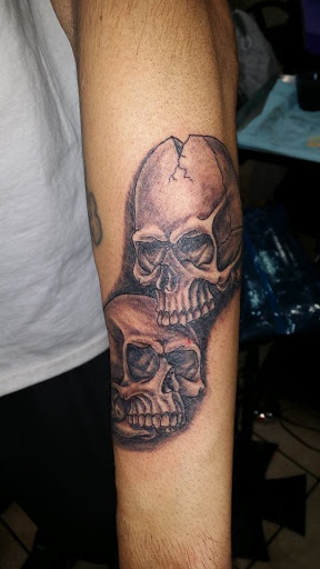 Explore tattoo word ideas for men, creative tattoo ideas in Springfield, available at Afterlife Tattoo Studio