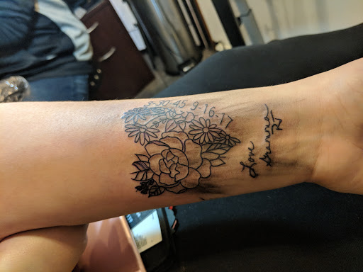 Tattoo Shop «Pincushns», reviews and photos, 214 College Ave, Holland, MI 49423, USA