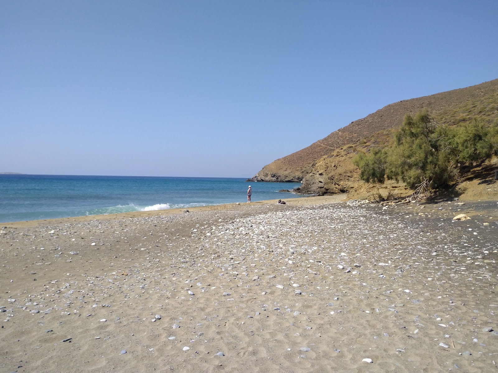 Megas Potamos'in fotoğrafı taşlı kum yüzey ile