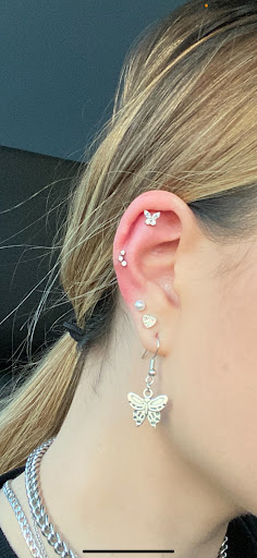 Explore roman numeral tattoo ideas for guys, creative tattoo ideas in Westminster, available at Lulu Ave Jewelry & Piercing Studio