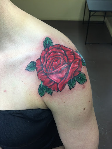 Explore red tattoo cover up ideas, creative tattoo ideas in Salina, available at Supercharged Tattoo