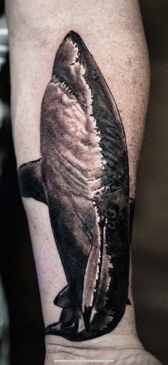 Explore flower back tattoo ideas, creative tattoo ideas in Deerfield Beach, available at Black Rose Tattoo Studio