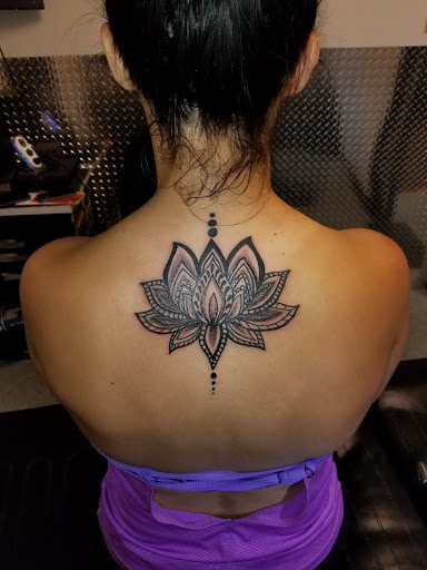 Explore band tattoo ideas, creative tattoo ideas in Canal Winchester, available at 22 Caliber Tattoo Studio Canal Winchester