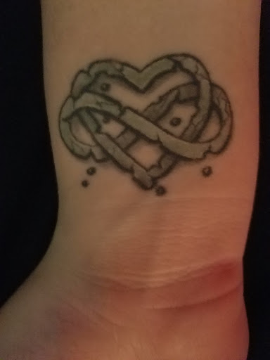 Tattoo Shop «Ink Slingers», reviews and photos, 1355 E Kearney St, Springfield, MO 65803, USA