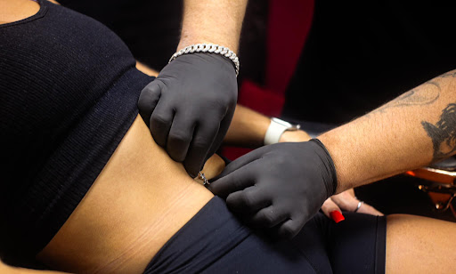 Explore arm tattoo men ideas, creative tattoo ideas in Franklin, available at Broadway Ink Tattoos and Piercings
