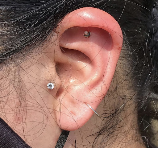 Explore hmong tattoo ideas, creative tattoo ideas in San Diego, available at Luna Studio Body Piercings & Tooth gems