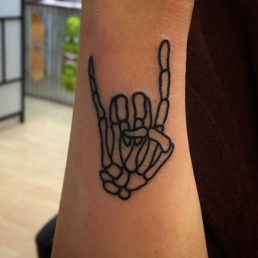 Explore dragon head tattoo ideas, creative tattoo ideas in Sacramento, available at 13 MAG TATTOO