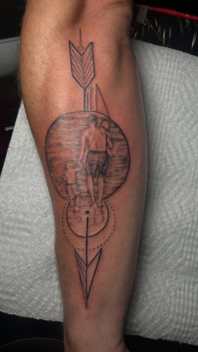 Explore checkered flag tattoo ideas, creative tattoo ideas in Harrah, available at Gypsy Blood Body Art Studio