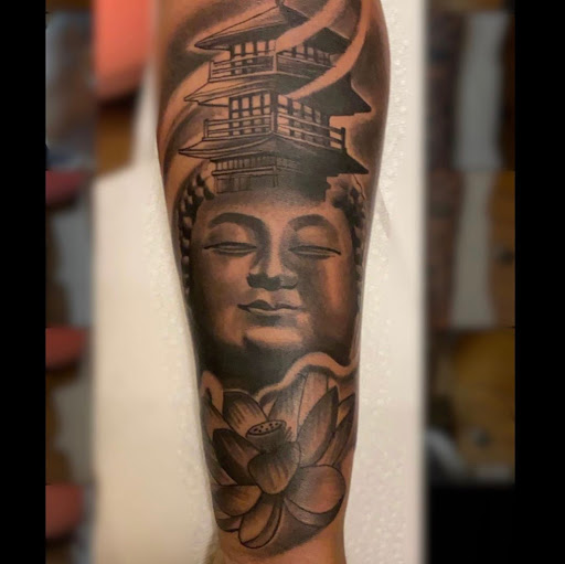 Explore male shoulder tattoo ideas, creative tattoo ideas in Starkville, available at Xclusive Ink Tattoo Company