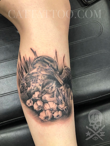 Explore big flower tattoo ideas, creative tattoo ideas in Addison, available at Cat Tattoo