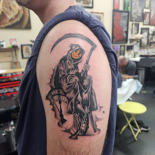 Explore japanese cherry blossom tattoo ideas, creative tattoo ideas in Smithtown, available at Authentic Arts Tattoo & Piercing