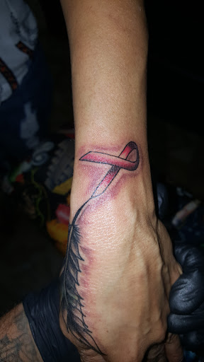 Explore neck tattoo ideas for woman, creative tattoo ideas in Los Angeles, available at South Central Tattoos