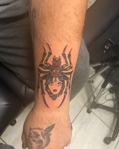 Explore outcast tattoo ideas, creative tattoo ideas in Foley, available at Symbolic Ink Tattoo Studio