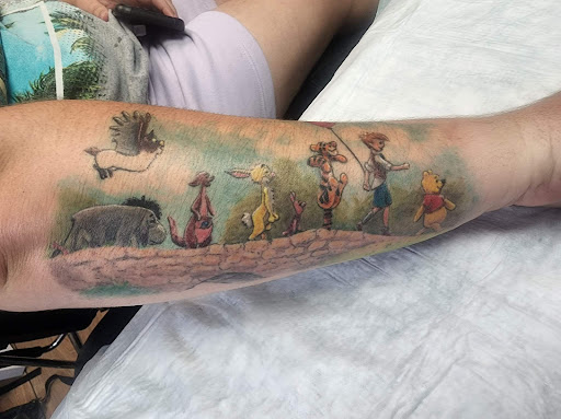 Explore elegant spine tattoo ideas, creative tattoo ideas in Fort Pierce, available at Goodfellas Tattoo & Body Piercing