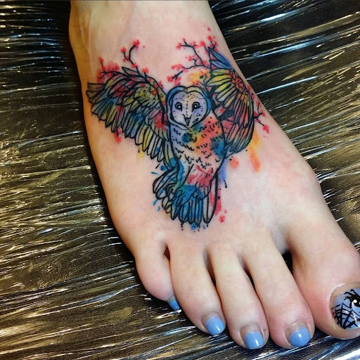 Explore fall leaf tattoo ideas, creative tattoo ideas in Benton, available at Spectrum Tattoo