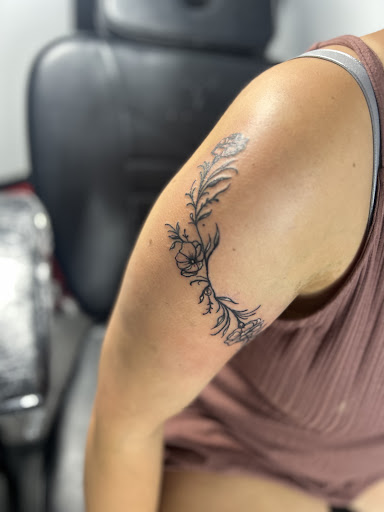 Find small palm tree tattoo ideas for your next unique tattoo in Oconomowoc at Kitty Kattoo