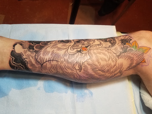 Explore bracelet tattoo ideas with names, creative tattoo ideas in Omaha, available at Liquid Courage Tattoos