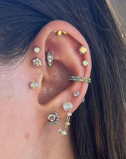 Explore female hip tattoo ideas, creative tattoo ideas in Waukesha, available at Golden Crystal Body Piercing