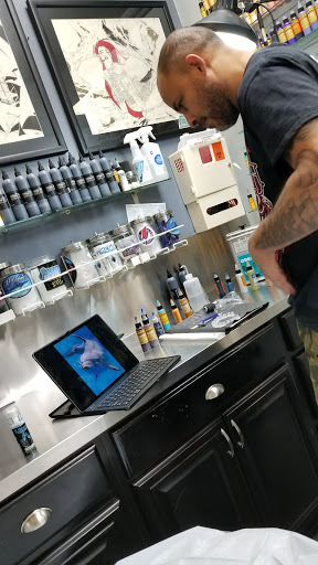 Explore mother son tattoo ideas, creative tattoo ideas in Deerfield Beach, available at Black Rose Tattoo Studio