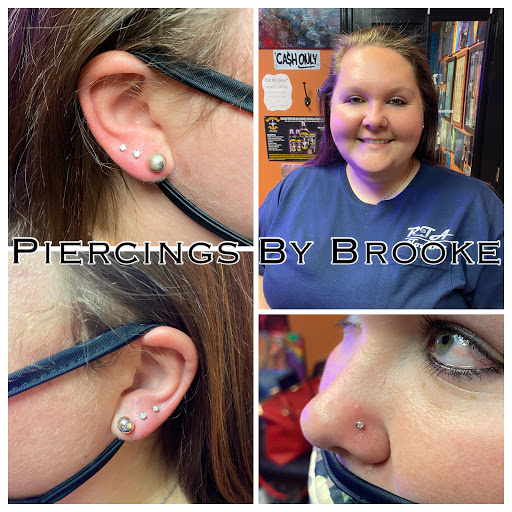 Explore watercolor flower tattoo ideas, creative tattoo ideas in Covington, available at Cupid Slave Tattoo Company