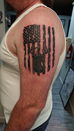 Explore purple flower tattoo ideas, creative tattoo ideas in Jonesboro, available at Immortal Ink