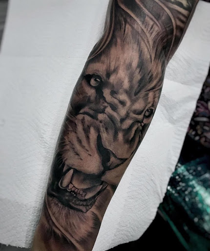 Explore outdoor tattoo ideas for men, creative tattoo ideas in Miami, available at Inkaholik Tattoos Kendall