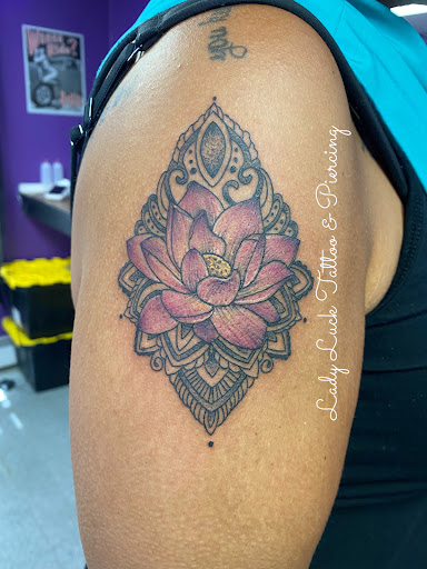 Explore 2001 tattoo ideas, creative tattoo ideas in Goshen, available at Lady Luck Studio