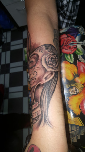 Explore tattoo cover up ideas for words, creative tattoo ideas in Los Angeles, available at South Central Tattoos