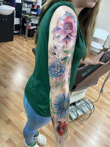 Explore dog tag tattoo ideas, creative tattoo ideas in Benton, available at Spectrum Tattoo