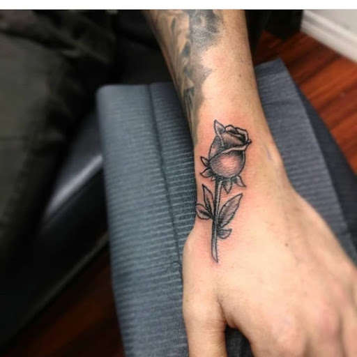 Explore cursive tattoo ideas, creative tattoo ideas in Atlantic Beach, available at The Ink Chamber Tattoo Parlor