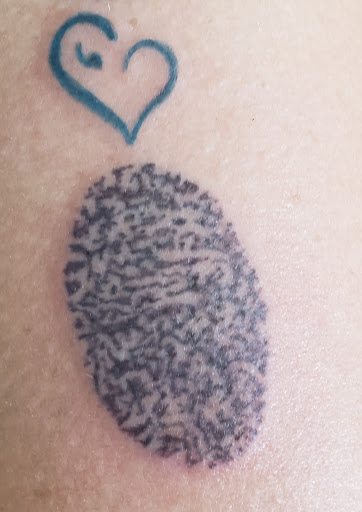 Explore unconditional love symbol tattoo ideas, creative tattoo ideas in Fort Mohave, available at Fort Mohave Tattoo Company