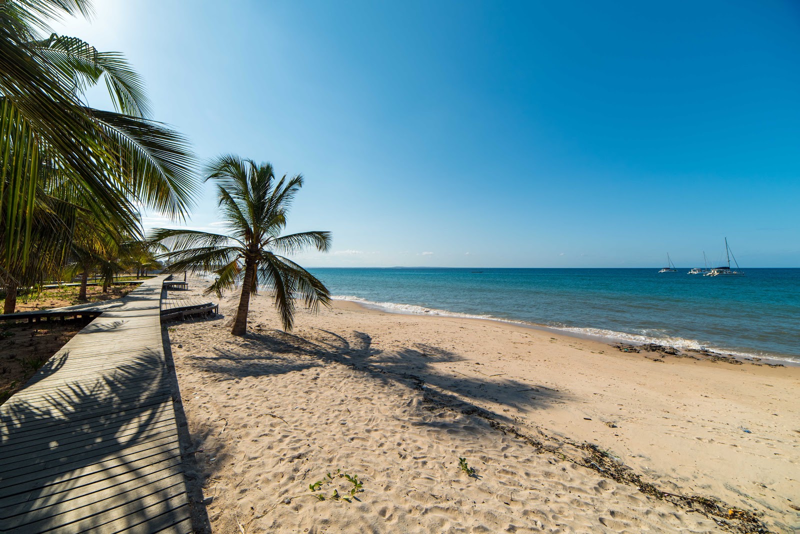Zdjęcie Wimbe Beach z powierzchnią beżowy piasek