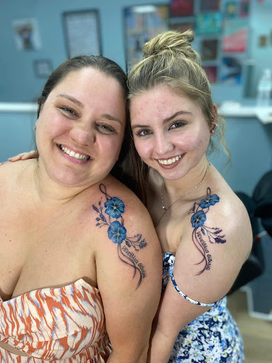 Explore hand tattoos men ideas, creative tattoo ideas in Ocala, available at Beauty in a Canvas Tattoo and Art Gallery