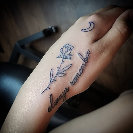 Explore moonshine tattoo ideas, creative tattoo ideas in Debary, available at Divine Line Tattoos