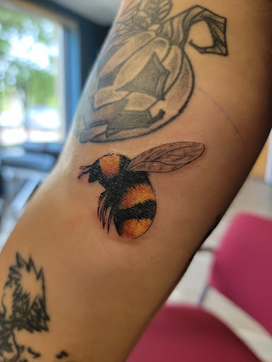 Find cambodian tattoo ideas for your next unique tattoo in East Rochester at Spice City Tattoo